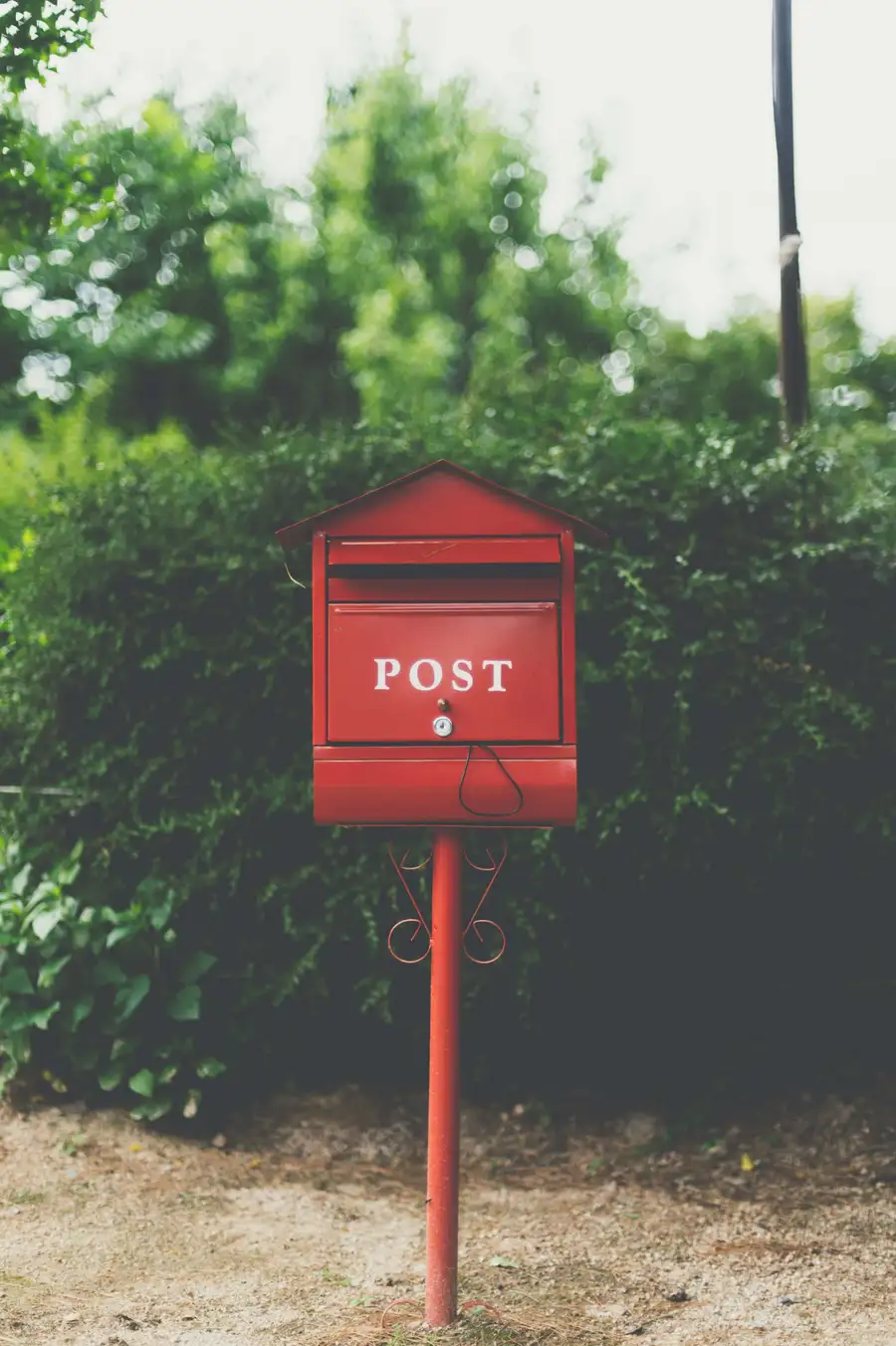 A post-mounted mailbox representing direct communication and follow-up with RCAN.